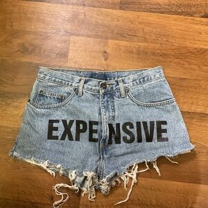 Trendy Blue Jean Shorts with Distressed Hem